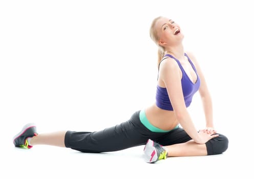 Blonde girl does gymnastics