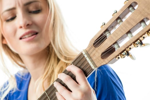 Blonde girl with guitar
