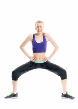 Blonde girl does gymnastics