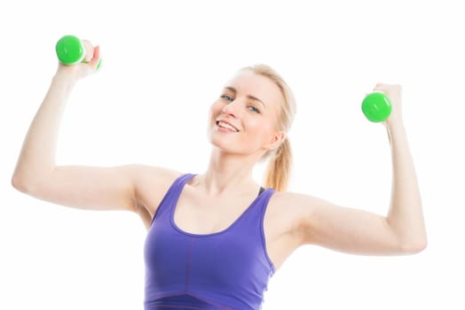 Blonde girl trained with dumbbells