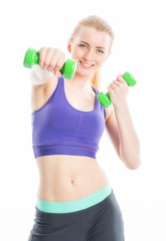 Blonde girl trained with dumbbells