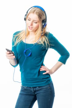 Blonde girl with headphones and smartphone