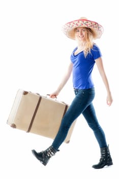 Blonde girl with suitcase