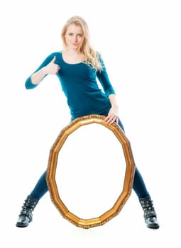 Blonde girl holds a gold picture frame