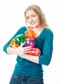 Blonde girl with piggy banks
