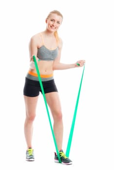 Blonde athlete trains with Theraband