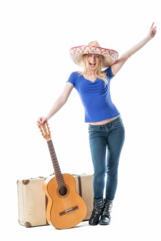 Blonde girl with suitcase and guitar