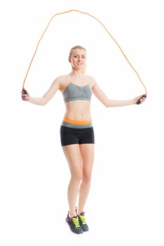 Blonde girl with skipping rope