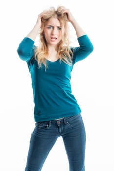 Blonde girl rupese her hair
