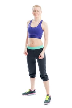 Blonde girl does fitness exercises