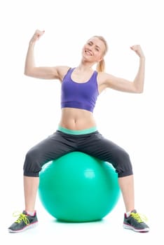 Blonde athlete on a pezziball