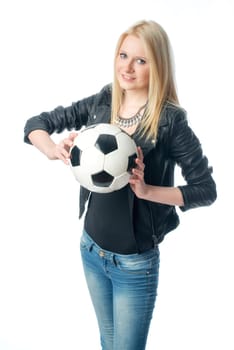 Blonde girl in leather jacket with football