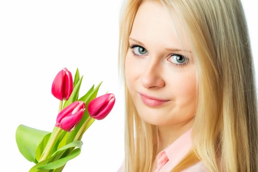 Young blonde girl holds tulip bouquet