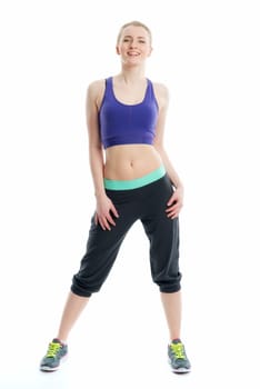 Blonde girl does fitness exercises