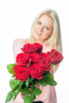 Blonde girl with bouquet of roses