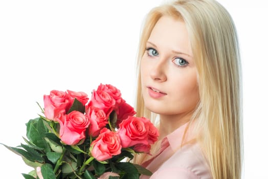 Blonde girl with bouquet of roses