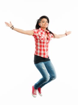 Young girl jumps into the air with joy