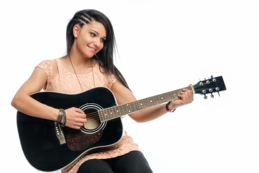 Black-haired girl with guitar