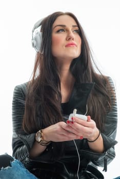 Young woman with Mp3 player and headphones