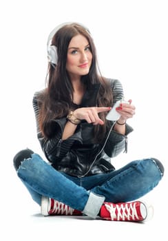 Young woman with Mp3 player and headphones