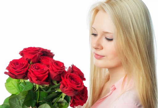 Blonde girl with bouquet of roses