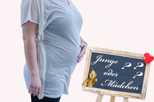 A pregnant woman's torso against a white background