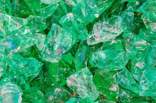 Quartz stone,pieces of glass in green as decoration for house and garden..