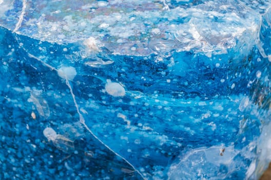 Quartz stone,pieces of glass in blue as decoration for house and garden..