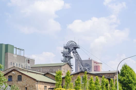 Conveyor colliery tower on an industrial plant still in operation.