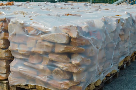 Dry stone bricks made of German sandstone on a pallet ready for processing