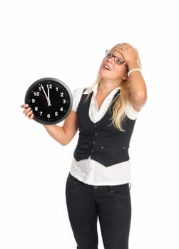 Businesswoman with wall clock