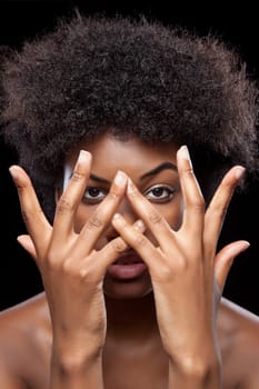 Young African beauty covering face with hands