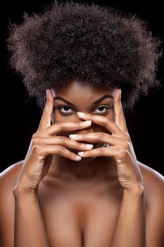 Young African beauty covering face with hands
