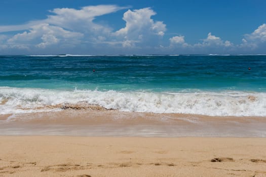 Beautiful secluded sandy beach in the Caribbean with white sand and blue sky as in paradise