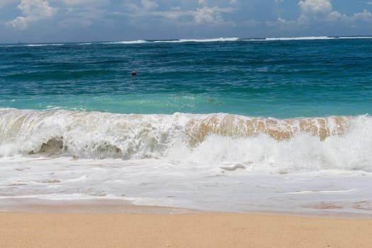 Beautiful secluded sandy beach in the Caribbean with white sand and blue sky as in paradise