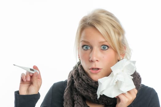 Sick woman with fever thermometer