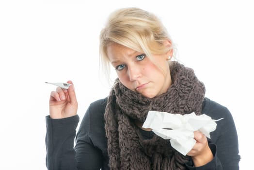 Sick woman with fever thermometer