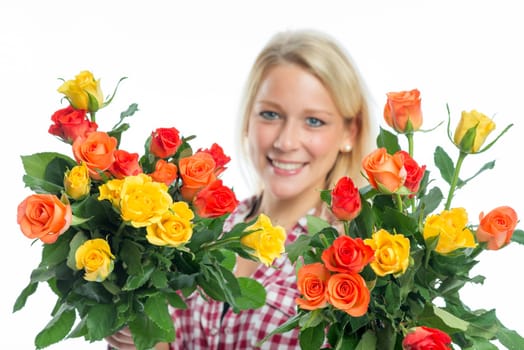 Blonde woman holds rose bouquet