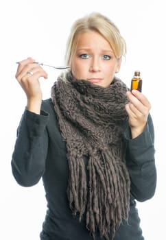 Sick woman with cough drops
