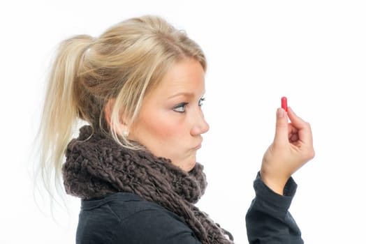 Sick blonde woman with medication