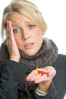 Sick blonde woman with medication