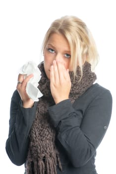 Sick blonde woman with handkerchief