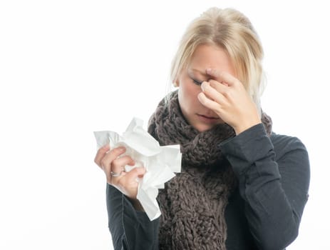 Sick blonde woman with handkerchief