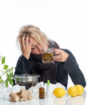 Sick blonde woman with remedies