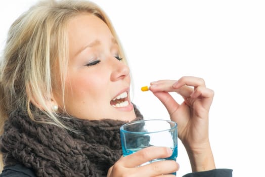 Sick blonde woman with medication