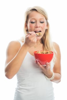 Blonde woman holds a breakfast bowl