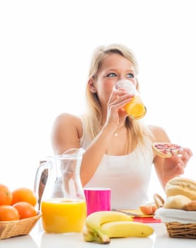 Blonde woman at the breakfast table