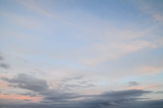 Cloudscape, Colored Clouds at Sunset near the Ocean