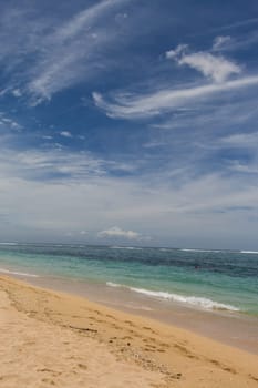 Beautiful secluded sandy beach in the Caribbean with white sand and blue sky as in paradise