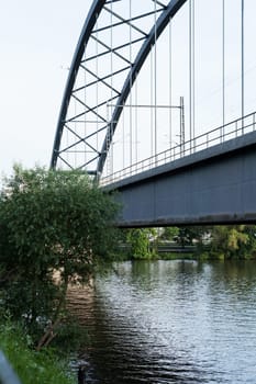 Abandoned bridge with rails for train traffic in daylight